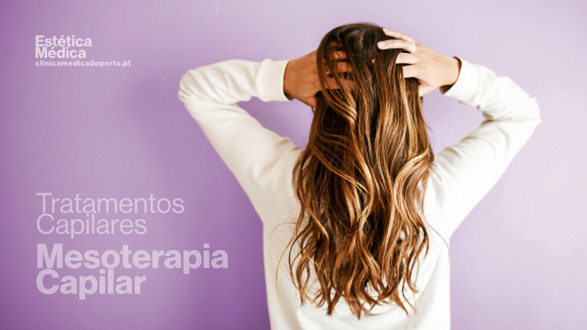 Uma mulher com cabelos compridos destaca-se contra um fundo roxo vibrante, exalando elegância e confiança.